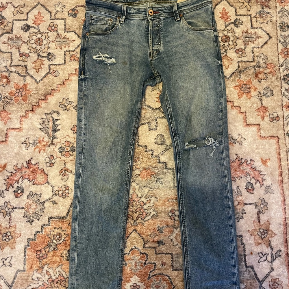 Blue Skinny Jeans with Distressed Details